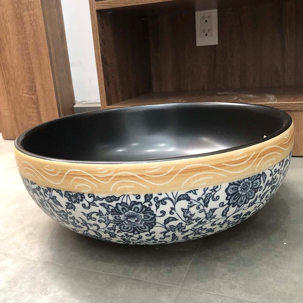 Ảnh công trình thực tế Chậu lavabo đặt bàn Kanly sứ hoa văn SU113