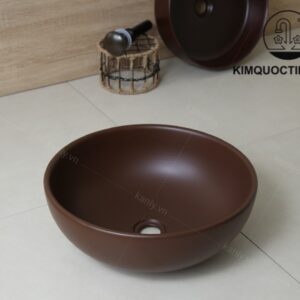 Ảnh công trình thực tế Chậu Lavabo Kanly SU511 Đặt Bàn Sứ Tròn Màu Nâu