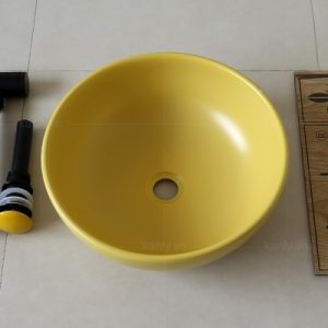 Ảnh công trình thực tế Chậu Lavabo Kanly SU514 Đặt Bàn Sứ Tròn Màu Vàng